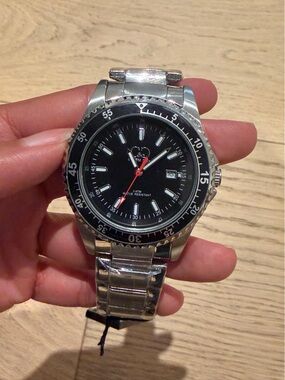 Curtis & Co. black & silver watch with black dial, silver-tone hands and markers